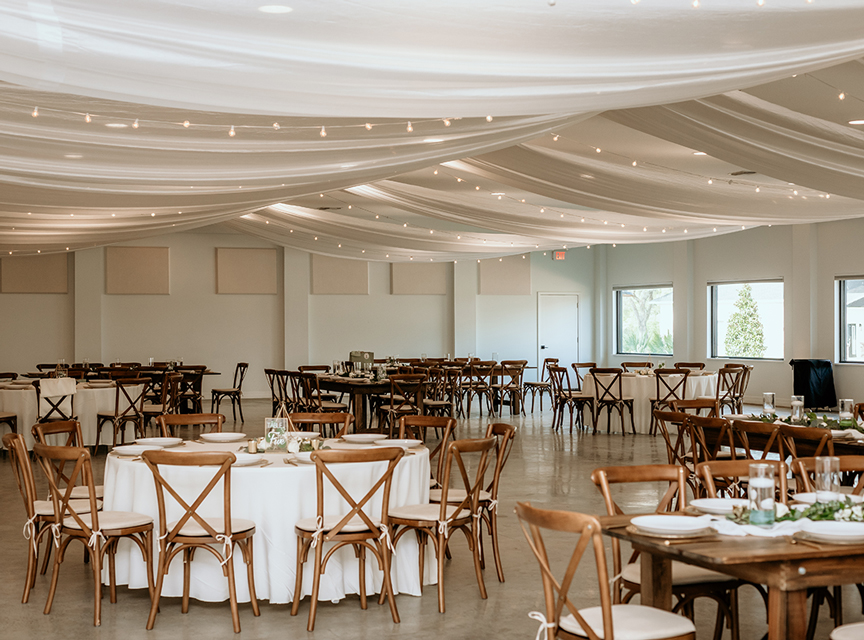 Grand-Ballroom-6 Grand Ballroom at Simpson Lakes filled with Tables and Chairs